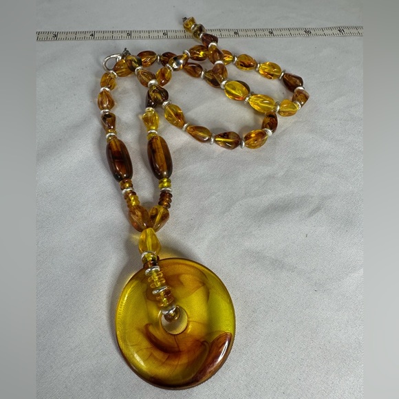 Unusual unique swirled amber colored statement necklace - Picture 7 of 7